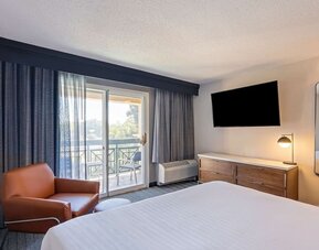 Bright and spacious day use room with balcony and work desk at Sonesta Select Pleasant Hill.