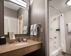 Private guest bathroom with free toiletries at Sonesta Select Phoenix Camelback.