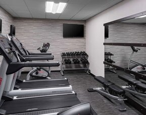 Well equipped fitness center at Sonesta Select Newport Middletown.