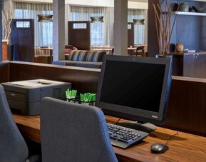 Business center with computer, printer and ergonomic chairs at Sonesta Select Indianapolis Carmel.
