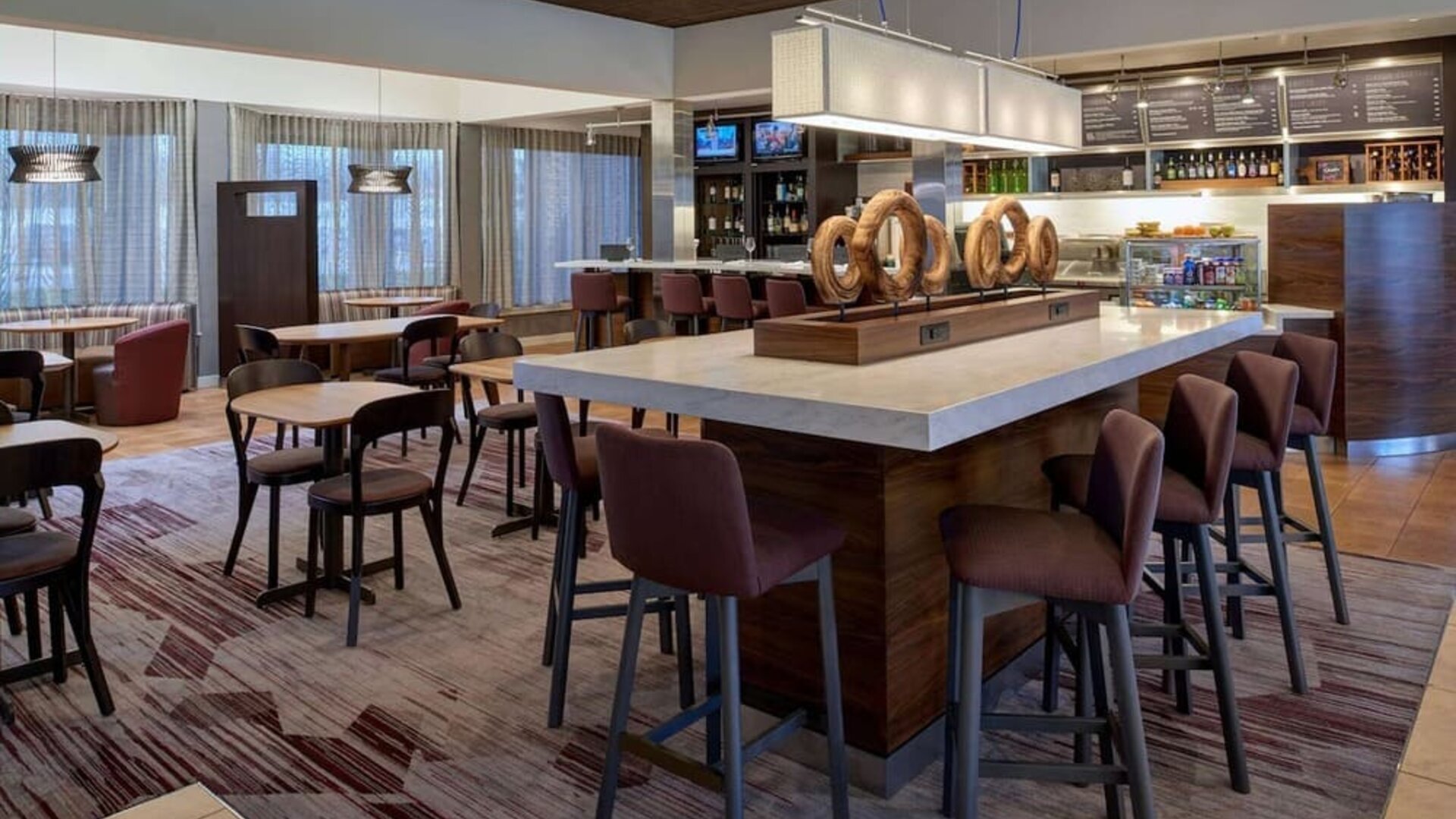 Dining area perfect for coworking at Sonesta Select Indianapolis Carmel.