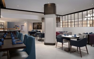 Dining area perfect for coworking at Hilton Crystal City At Washington Reagan National Airport.