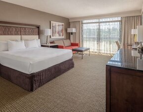 Day use room with work desk and sofa at Hilton Bellevue.