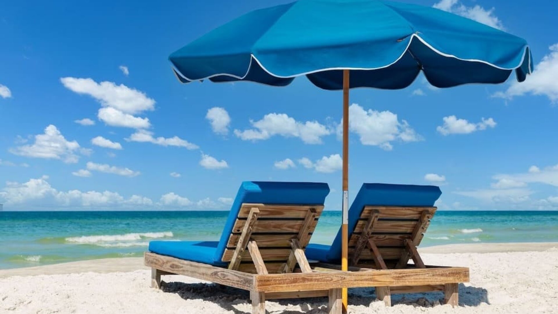 Beach sun loungers at DoubleTree Beach Resort By Hilton Tampa Bay - North Redington.