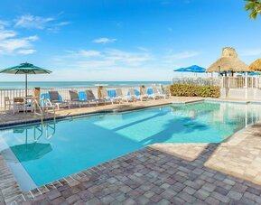 Outdoor pool overlooking the beach at DoubleTree Beach Resort By Hilton Tampa Bay - North Redington.