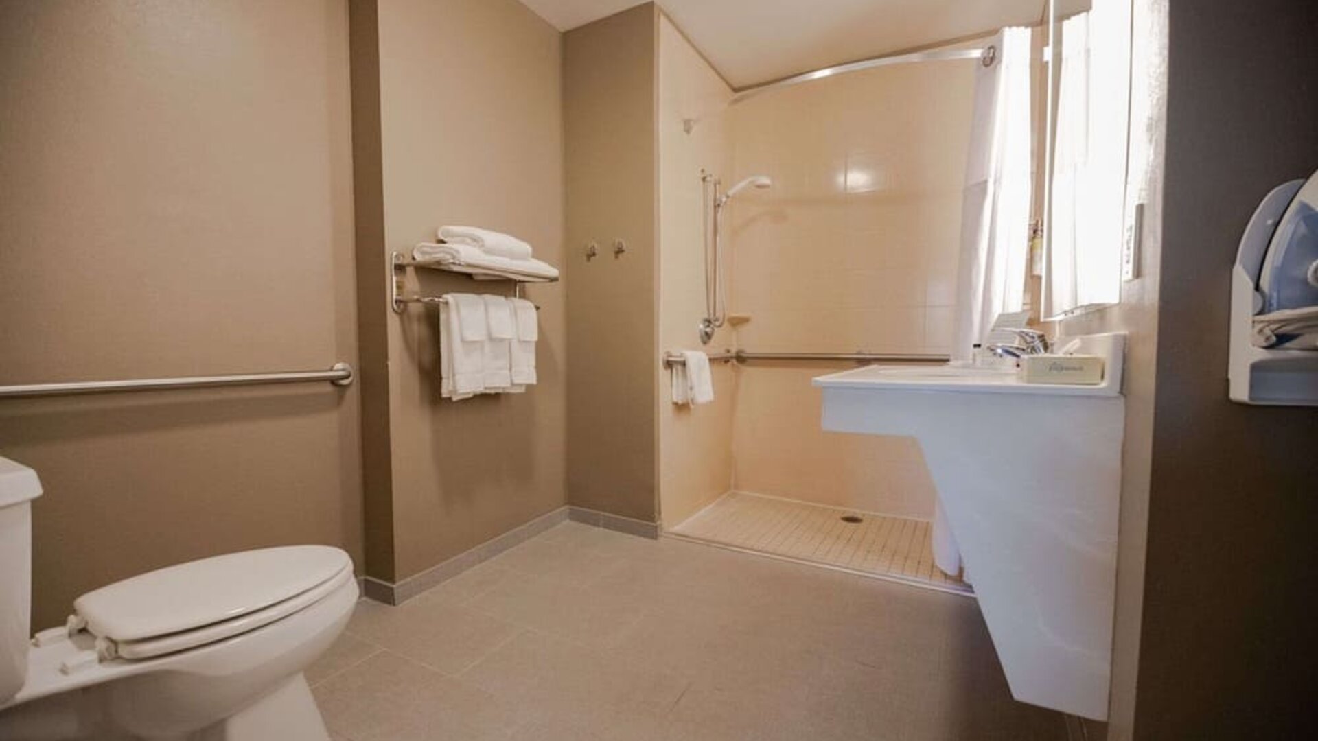 Private guest bathroom with shower at Sonesta ES Suites Dallas Las Colinas.