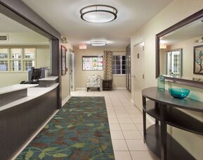 Hotel reception at Sonesta Simply Suites Dallas Las Colinas.
