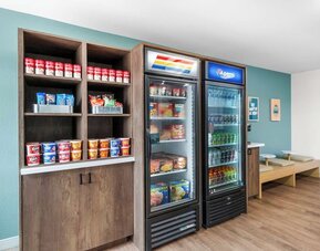 Hotel reception and convenience store at Sonesta Simply Suites Austin South.