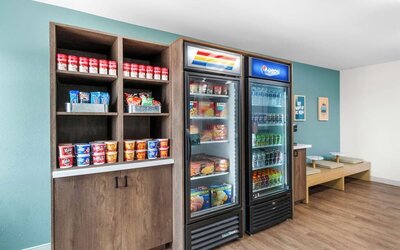 Hotel reception and convenience store at Sonesta Simply Suites Austin South.