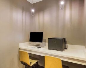 Business center with computer, printer and ergonomic chair at Sonesta ES Suites Parsippany Morris Plains.