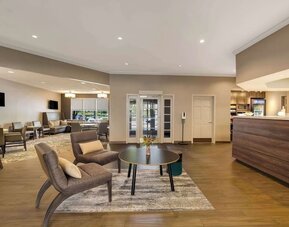 Lobby lounge with convenience store at Sonesta ES Suites Parsippany Morris Plains.