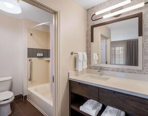 Private guest bathroom with combined shower and tub at Sonesta ES Suites Austin The Domain Area.