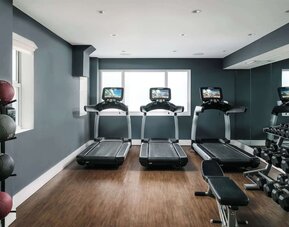 Well equipped fitness center at Nautilus Sonesta Miami Beach.