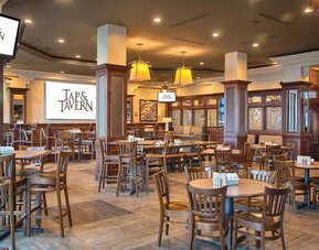 Dining area perfect for coworking at Embassy Suites By Hilton San Francisco Airport Waterfront.