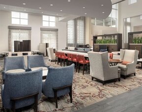 Lobby and coworking lounge at Embassy Suites By Hilton Birmingham.