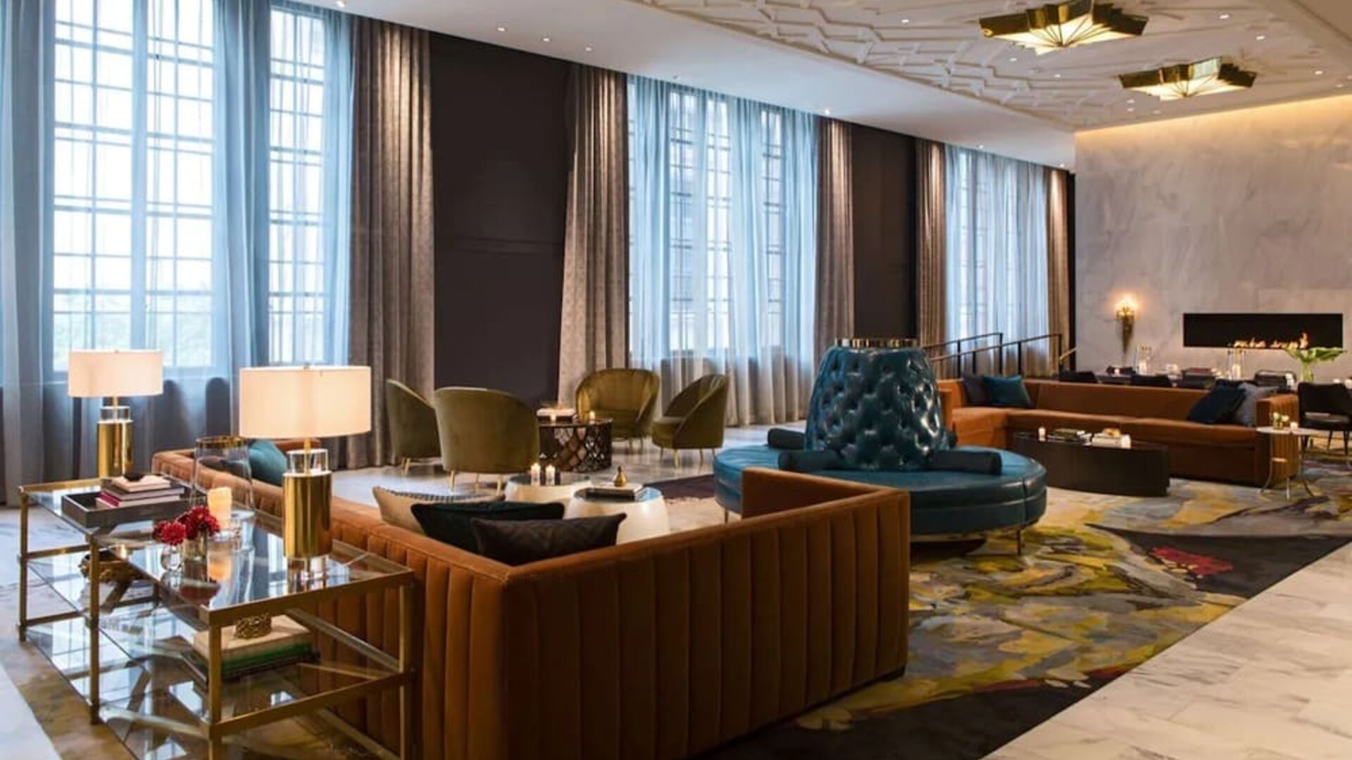 Comfortable and stylish lobby lounge with fireplace at The Allegro Royal Sonesta Hotel Chicago Loop.