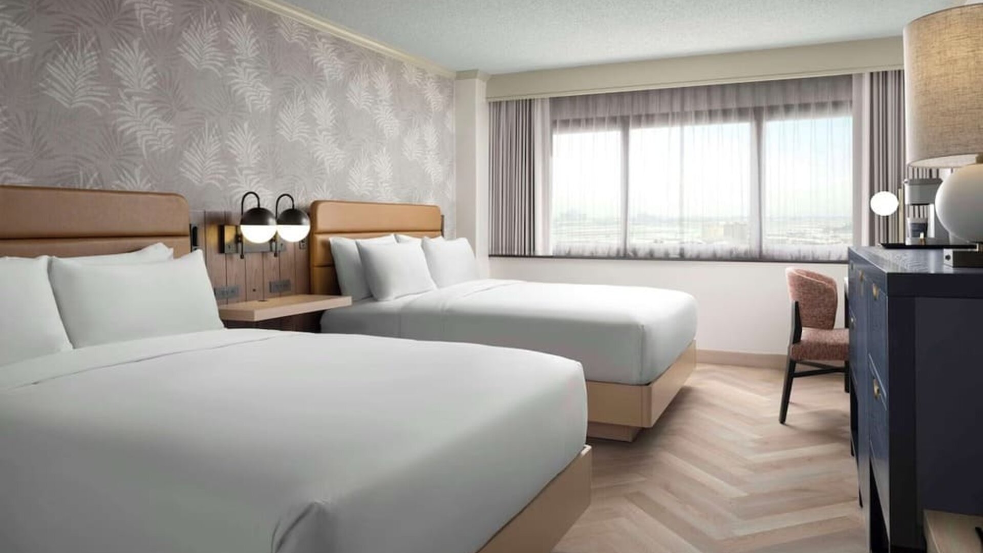 Day use twin room with work desk and natural light at Sonesta Los Angeles Airport LAX.