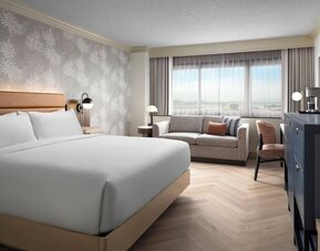 Day use room with work desk and sofa at Sonesta Los Angeles Airport LAX.