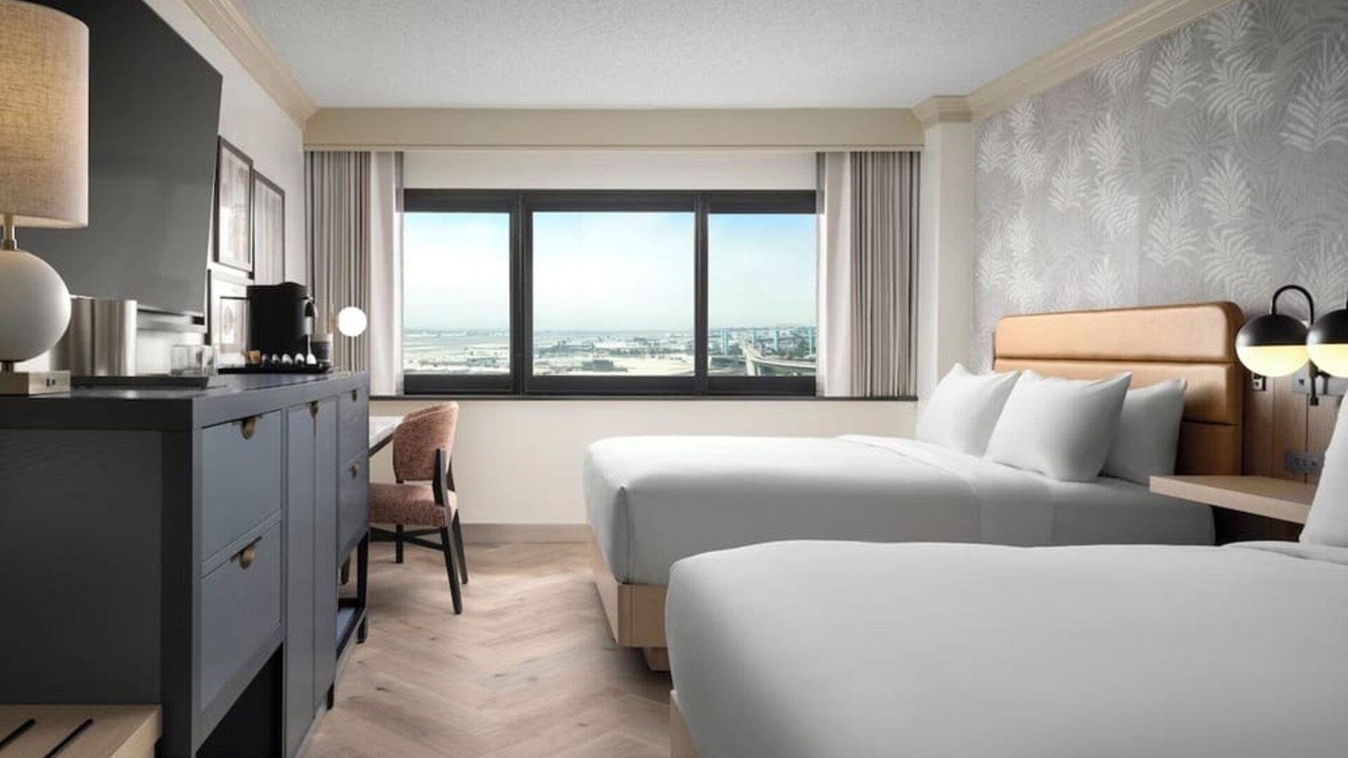 Bright and spacious day use twin room with work desk and private bathroom at Sonesta Los Angeles Airport LAX.