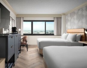 Bright and spacious day use twin room with work desk and private bathroom at Sonesta Los Angeles Airport LAX.