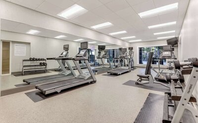 Fully equipped fitness center at Sonesta Anaheim Resort Area. 