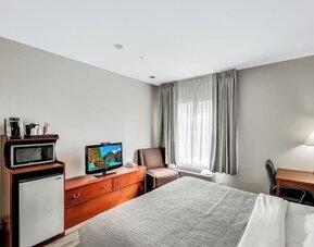 King room with TV at Quality Inn & Suites Liberty Lake - Spokane Valley.