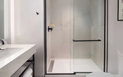 Private guest bathroom with shower at The Clift Royal Sonesta.