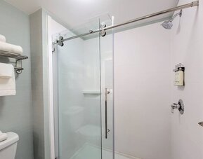 Private guest bathroom with shower and free toiletries at Holiday Inn Belcamp - Aberdeen Area.