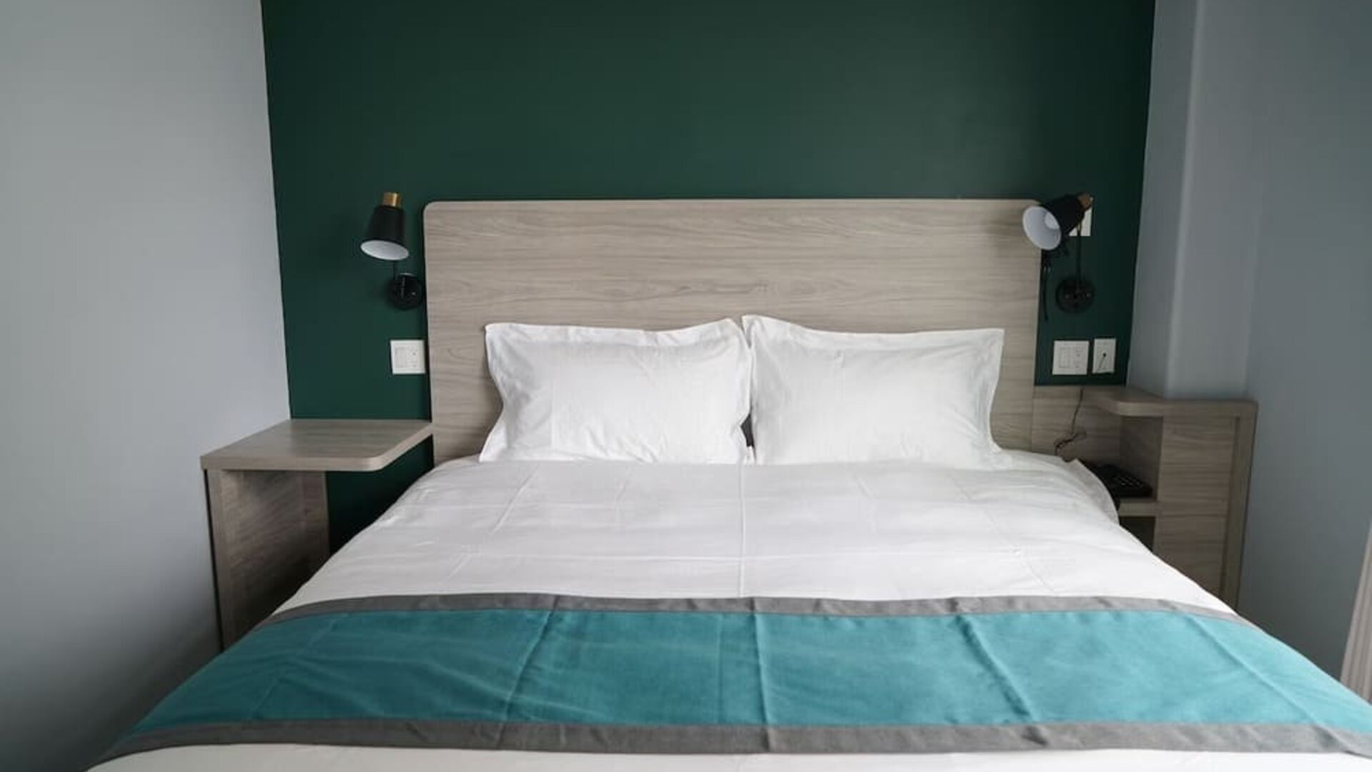 King bed at Starlight Hotel.