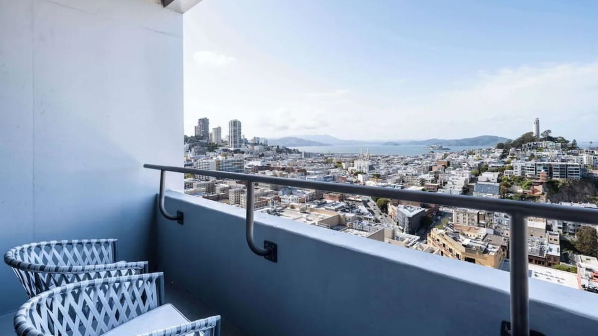 Balcony inside day use room overlooking the city at Hilton San Francisco Financial District.

