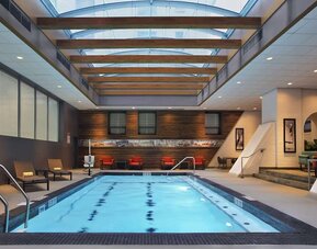 Bright-lit indoor pool at Palmer House A Hilton Hotel.