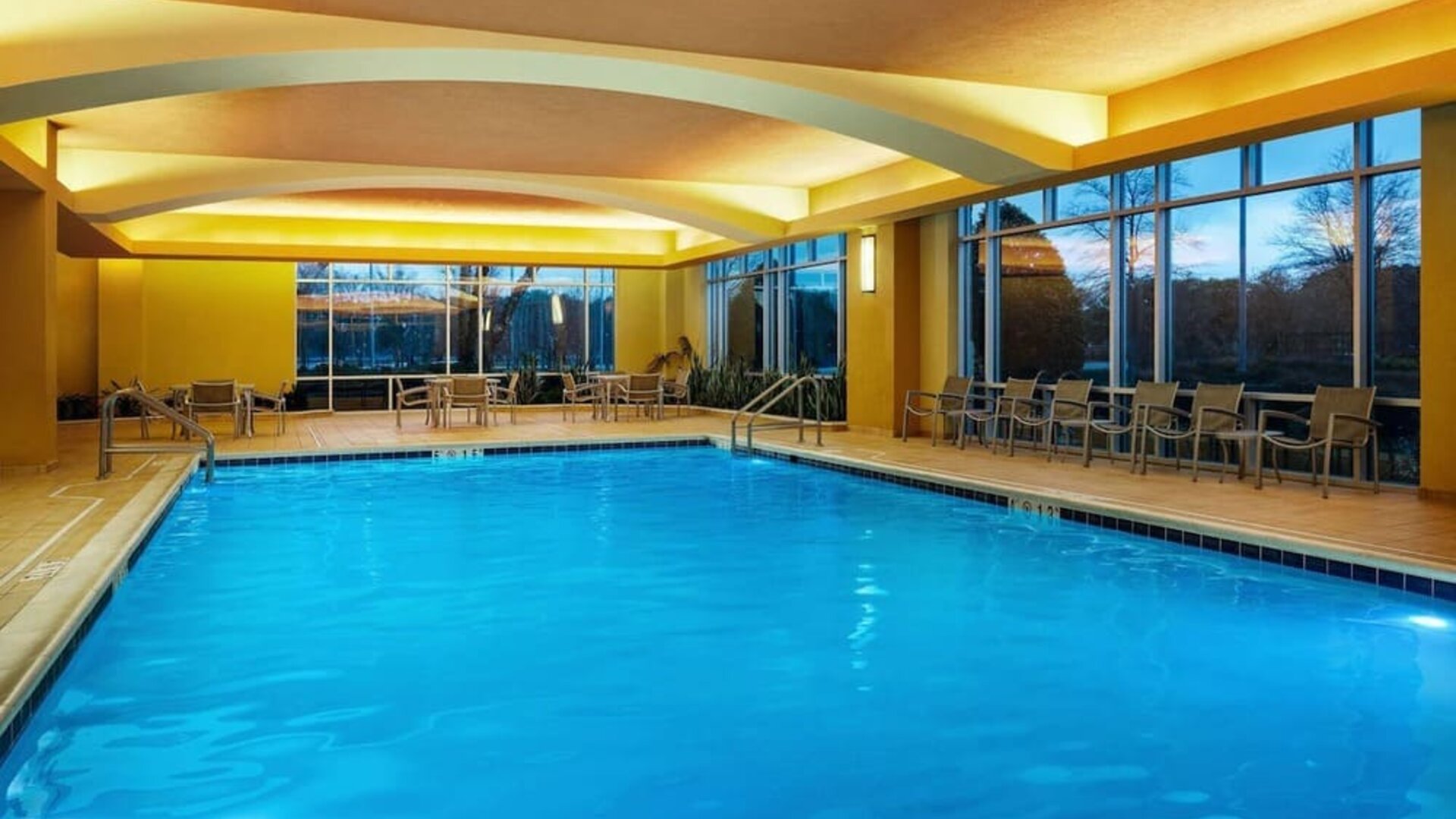 Refreshing indoor pool at Embassy Suites By Hilton Hampton Convention Center.