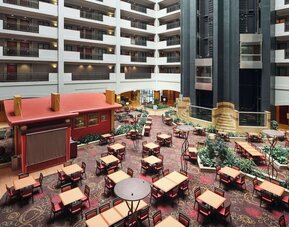 Dining area perfect for coworking at Embassy Suites By Hilton Hampton Convention Center.