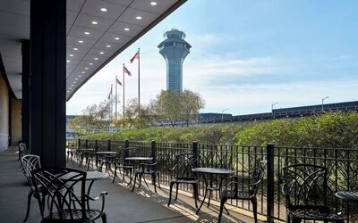 Outdoor seats at Hilton Chicago O'Hare Airport.