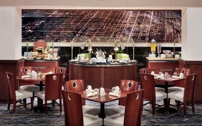 Dining area perfect for coworking at Hilton Chicago O'Hare Airport.