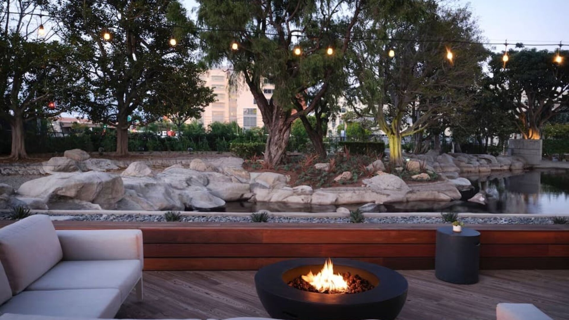 Firepit surrounded by comfortable chairs at Hotel Fera Anaheim, A DoubleTree By Hilton.