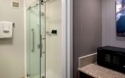 Private guest bathroom with shower at Sonesta Select Boston Milford.
