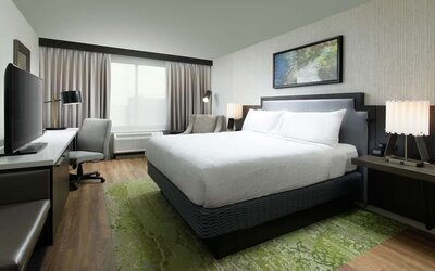 Day use room with work desk and natural light at Hilton Garden Inn Memphis Downtown.