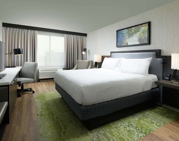 Day use room with work desk and natural light at Hilton Garden Inn Memphis Downtown.