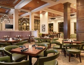 Dining area perfect for coworking at Hilton Garden Inn Memphis Downtown.