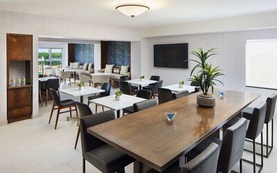 Executive lounge perfect for coworking at Hilton Charlotte Airport.
