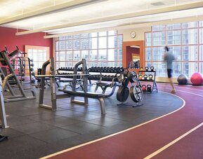 Fully-equipped fitness center at Hilton Chicago.