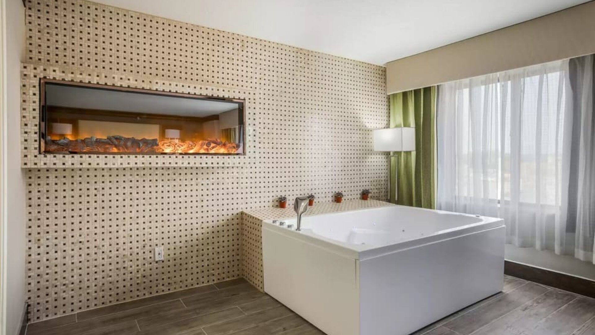 Bath tub inside day use room at The Leo Collection, An Ascend Collection Hotel.