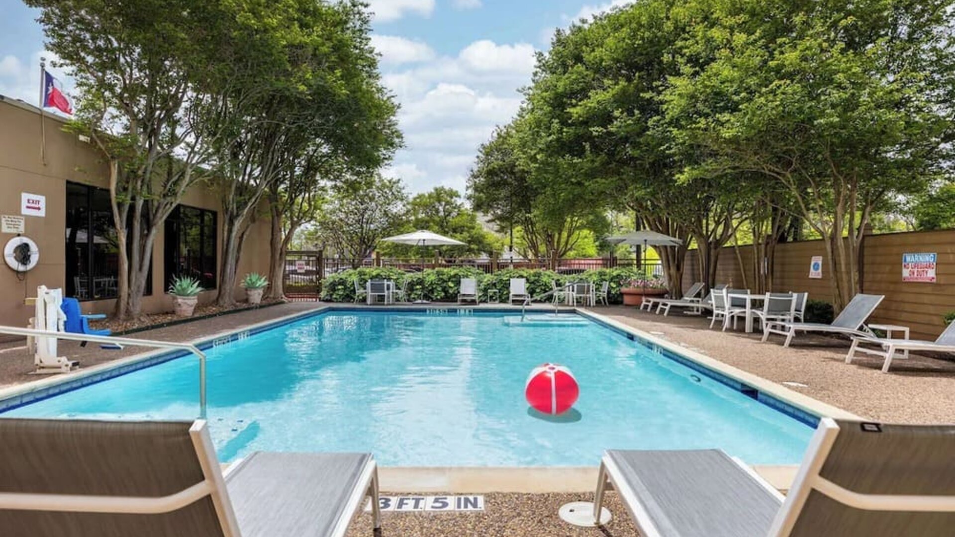 Relaxing outdoor pool at Doubletree By Hilton Houston Medical Center Hotel & Suites.