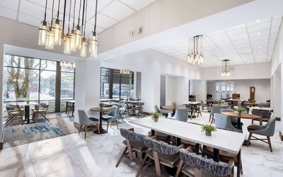 Dining area perfect for coworking at Doubletree By Hilton Houston Medical Center Hotel & Suites.