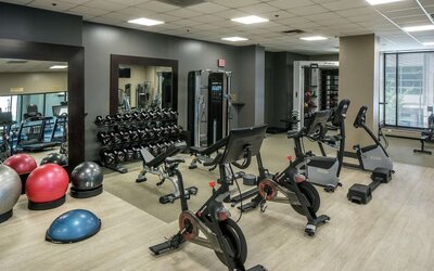 Fully equipped fitness center at Hilton Minneapolis.