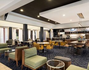 On-site restaurant with lounge seating at Sonesta Select San Jose Airport.