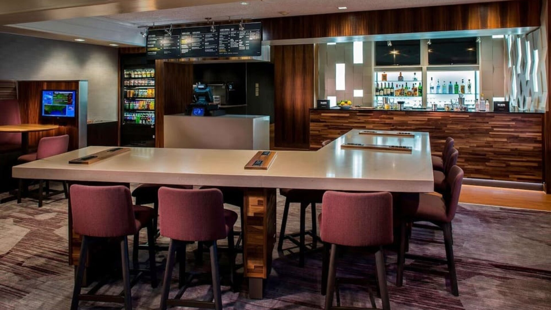 Dining area and workspace, perfect for coworking at Sonesta Select Boston Lowell Chelmsford.