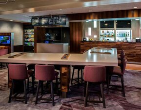 Dining area and workspace, perfect for coworking at Sonesta Select Boston Lowell Chelmsford.