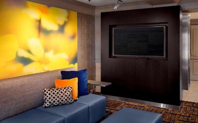Comfortable lounge seating and workplace at Sonesta Select Boston Danvers's lobby. 